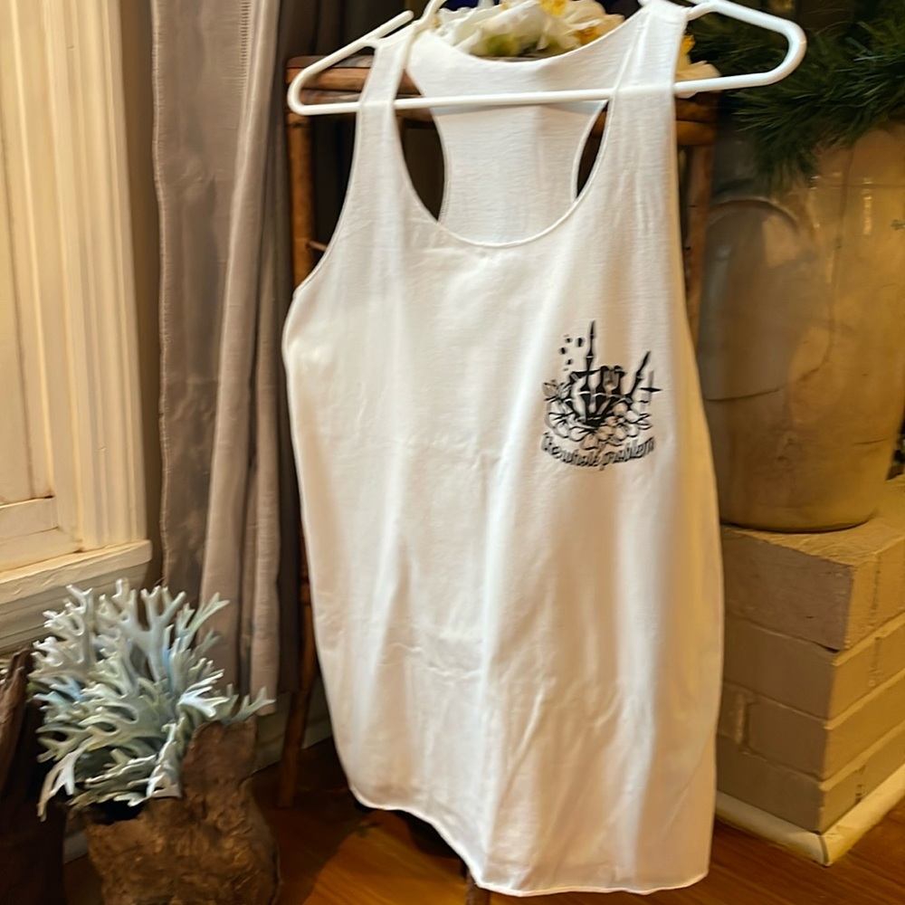 White medium-large tank don’t be a part of the problem be the whole problem